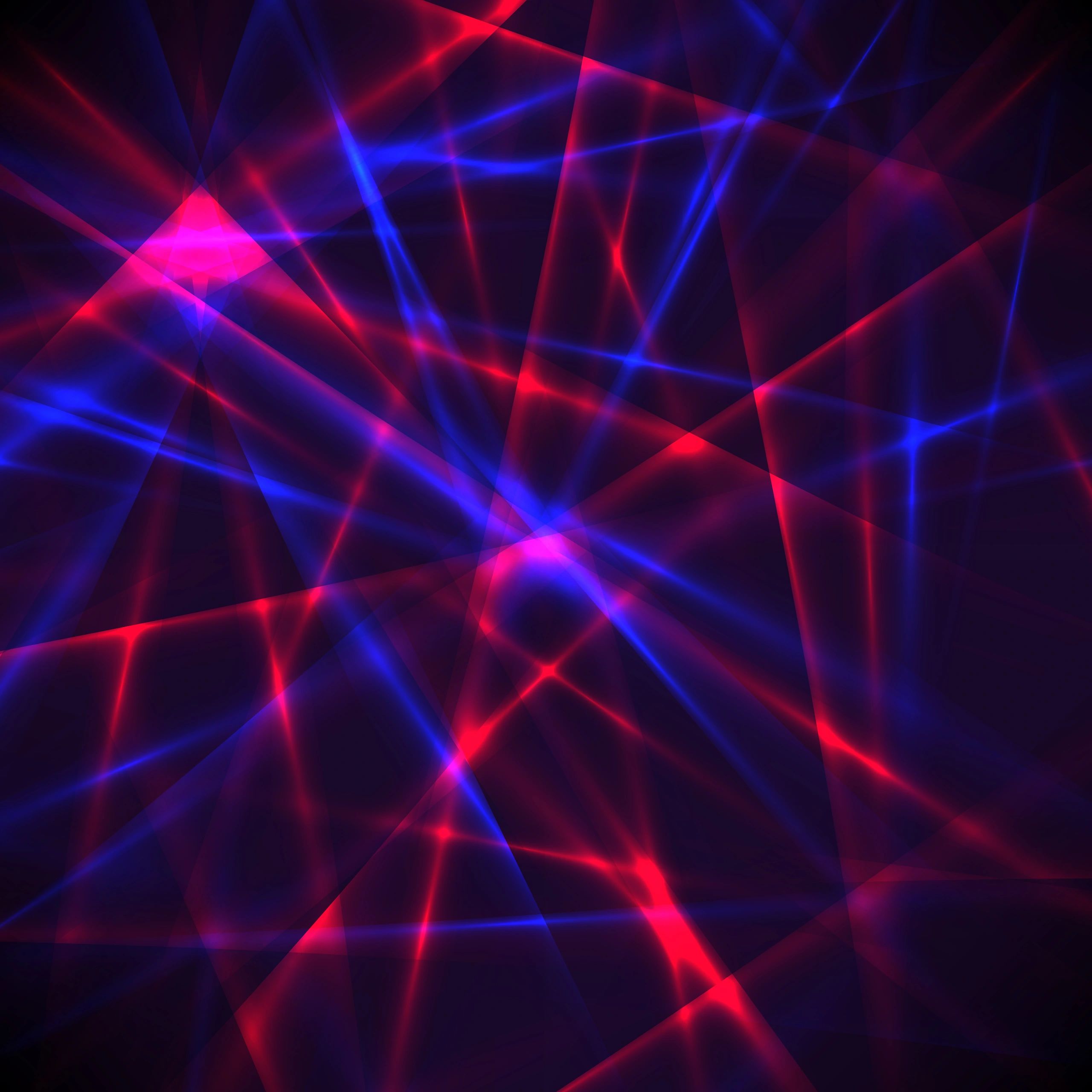 Abstract neon laser beams crossing on a dark futuristic background